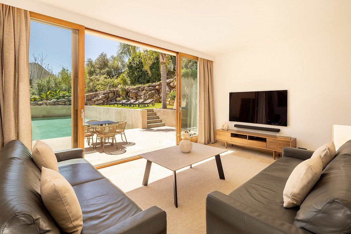 Living room opening onto the pool